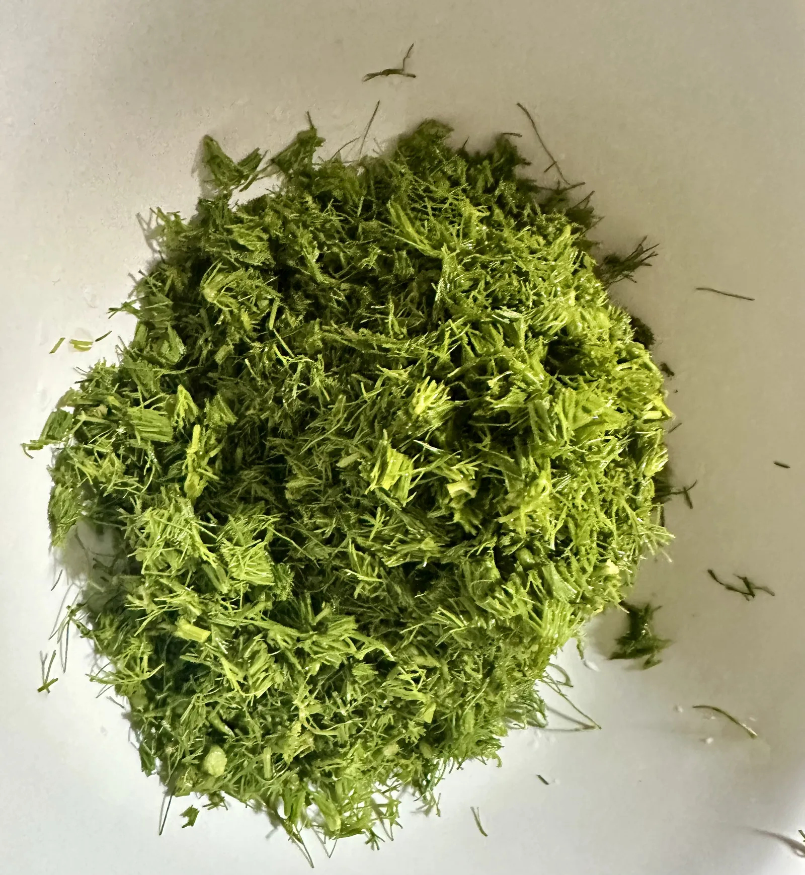 Finely chopped dill.